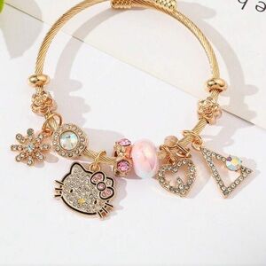 Hello Kitty Gold Bracelet with Pink Charms